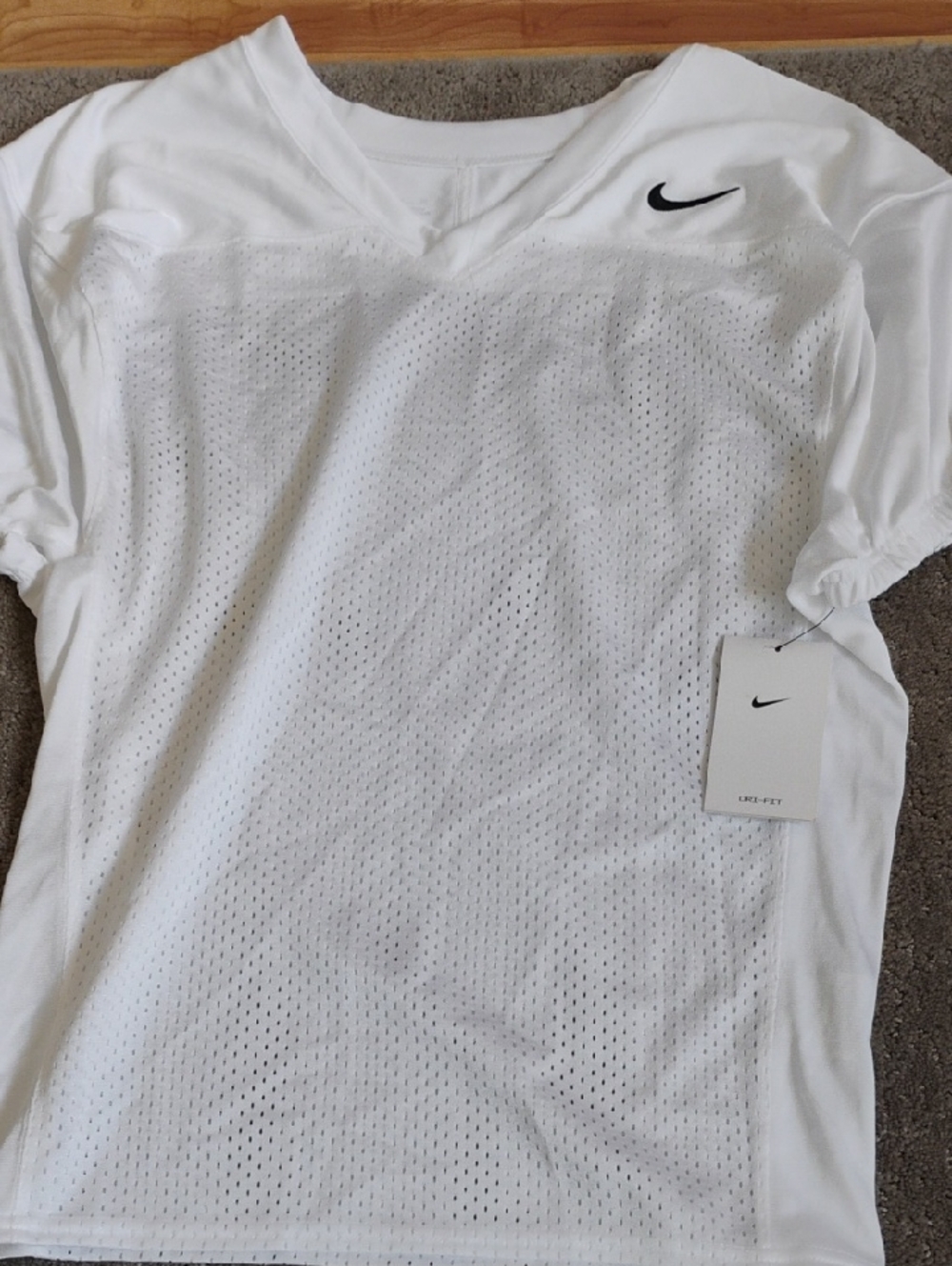 Nike White Mesh V-Neck Athletic Shirt with Black Swoosh . Men's small. Brand new